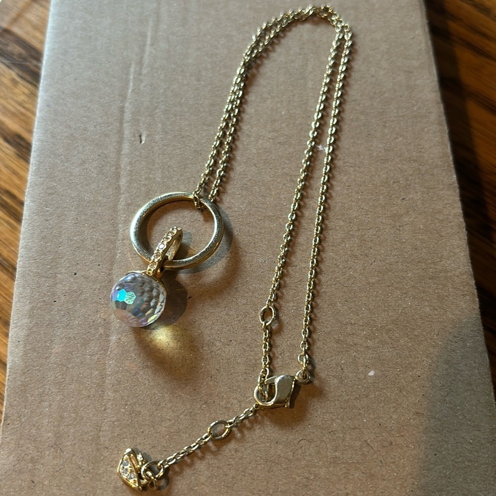 Swarovski circle crystal gold tone necklace swan